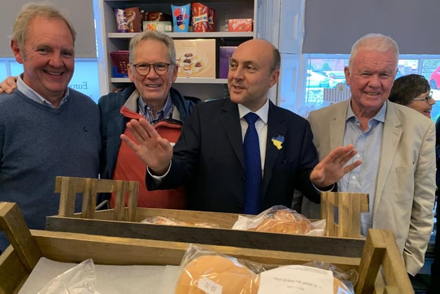 Arundel & South Downs MP Andrew Griffith meets volunteers at Findon Village Store and Post Office and congratulates them on winning the Queen's Award for Voluntary Service