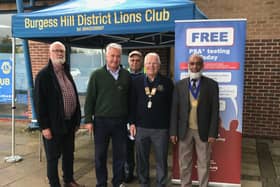 Members of Burgess Hill District Lions Club outside The Triangle with East Worthing and Shoreham MP Tim Lawton and deputy mayor of Burgess Hill Tofojjul Hussain