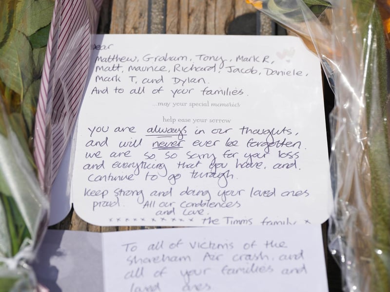 Floral tributes were laid on the Shoreham Old Tollbridge