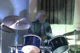 Steve Percy drumming at his 85th birthday party