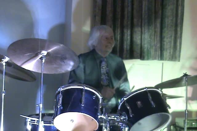 Steve Percy drumming at his 85th birthday party