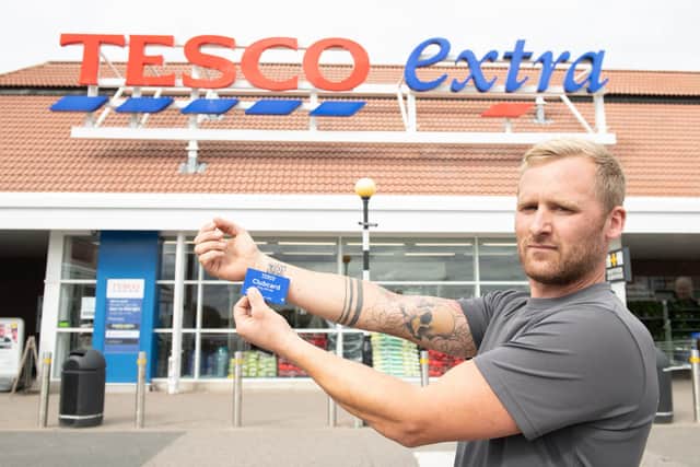 Horsham dad had his Tesco clubcard tattooed on his wrist after frequently forgetting to take the card with him when he went shopping