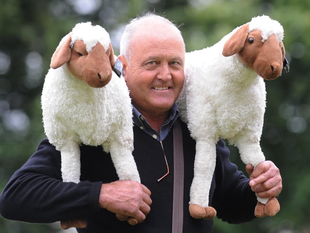 Ewes looking at you... Charles Smith fundraising for Rotary with his raffle prizes