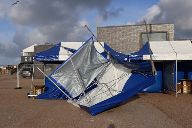 Storm damage to the tents at the Midsummer Fish Festival in Hastings. The damage happened Friday evening but the event still managed to open its gates to the public at 11am on Saturday. Photo by Kevin Boorman.