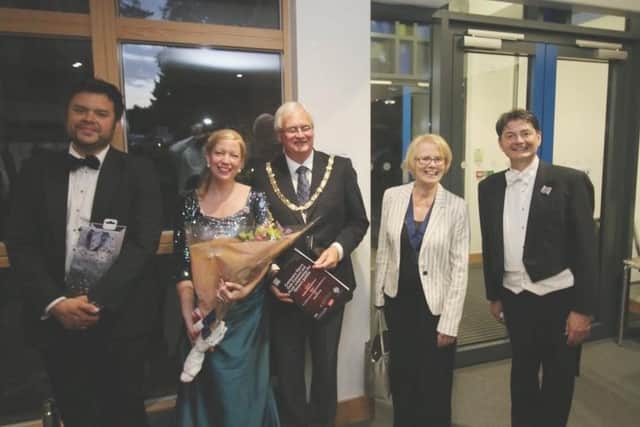 Haywards Heath town mayor Howard Mundin and consort at the Centenary Opera Gala Concert with Charne Rochford (tenor soloist), Zita
Syme (soprano soloist) and Stephen Anthony Brown (director of music)