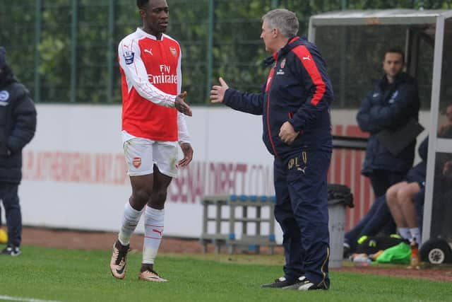 Danny Welbeck shakes hands with Assistant U21 Manager Carl Laraman during the match between Arsenal U21 and Brighton & Hove Albion U21 at London Colney on February 5, 2016.  (Photo by David Price/Arsenal FC via Getty Images)