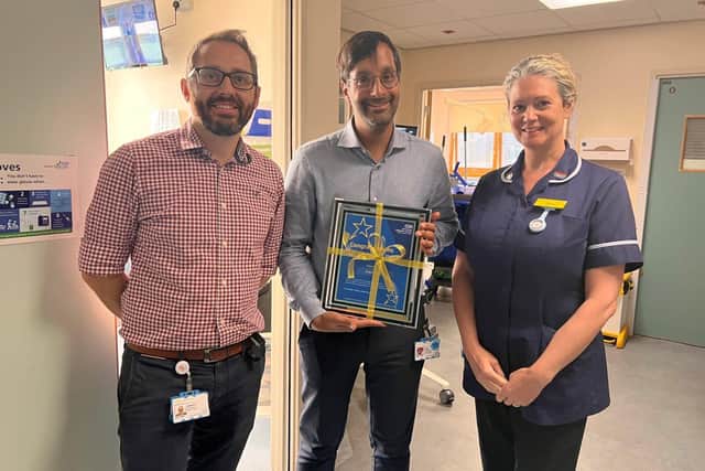 Praneil presented with his certificate alongside his team lead and Hospital Director of Nursing