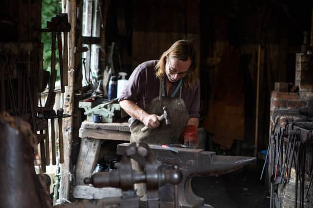 Blacksmith at work at the Weald &amp; Downland Living Museum 