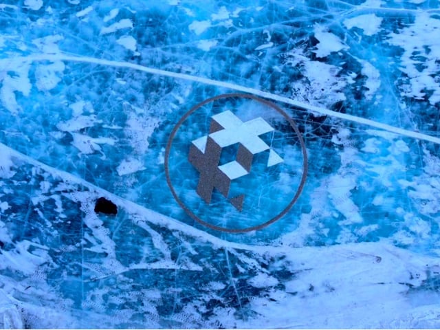 Geometric form on Khusvgol Lake made from fine gravel and snow 6m diameter