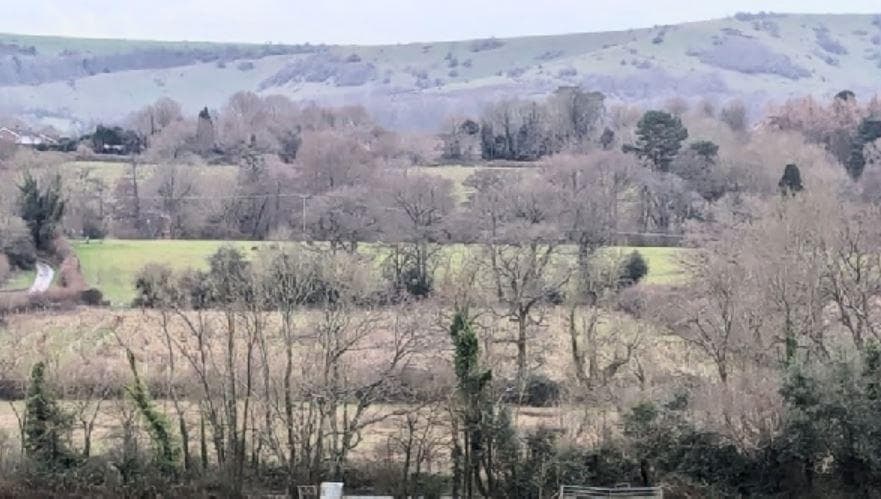 A fight has been launched to protect a 'green gap' between South Downs villages from development 
