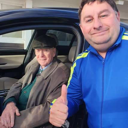 Sam 'Elvis' Labat with Sir Michael Caine