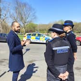 Eastbourne MP Josh Babarinde speaking with two Police Community Support Officers. Photo: contributed