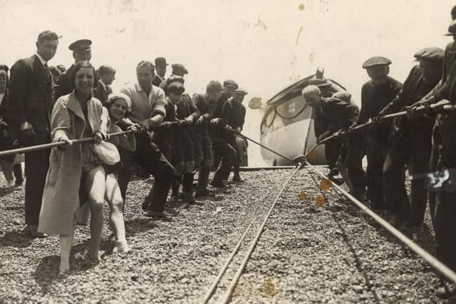 Brighton lifeboat being recovered up the beach in 1904. The new boat was named William Wallis after he left a legacy to the RNLI