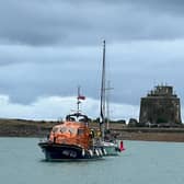 The volunteer crew at Eastbourne RNLI were paged at 3.58pm on July 24 after reports a 45ft yacht had suffered an engine fire whilst on way to Sovereign Harbour. Picture by Simon Wise
