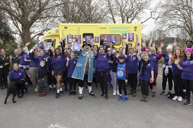 Worthing town crier Bob Smytherman with Billy and Beyond CIC founder Nicci Parish, walkers and paramedics Jenny Mussell and Jess Mills from South East Coast Ambulance Service