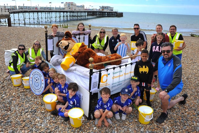 Worthing United Youth Football Club’s 30 teams took turns to push a bed along Worthing seafront to raise money for Chestnut Tree House