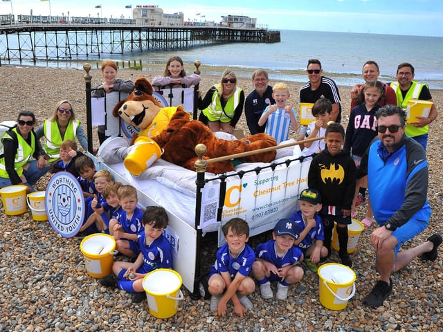 Worthing United Youth Football Club’s 30 teams took turns to push a bed along Worthing seafront to raise money for Chestnut Tree House