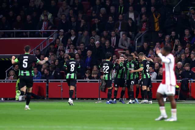 Brighton and Hove Albion players celebrating their first goal against Ajax in the Europa League (Photo by Dean Mouhtaropoulos/Getty Images)