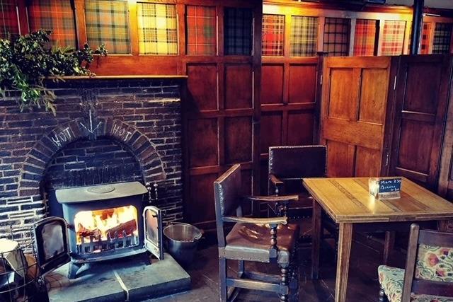 Cosy interior of the Albion showing the tartans