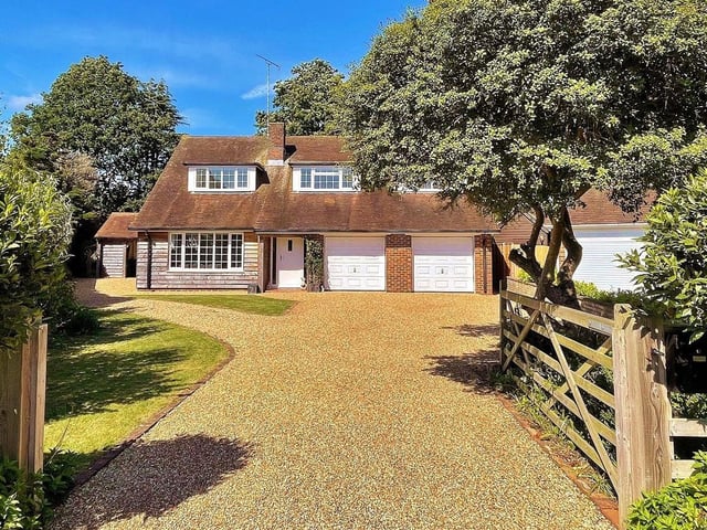 This home, in Ham Manor Close, Angmering, is situated on the exclusive, private Ham Manor Estate. It offers versatile accommodation with four/five bedrooms, an excellently sized lounge, a stunning open-plan kitchen/dining room and breathtaking views over Ham Manor Golf Course. Offers over £1.25million.