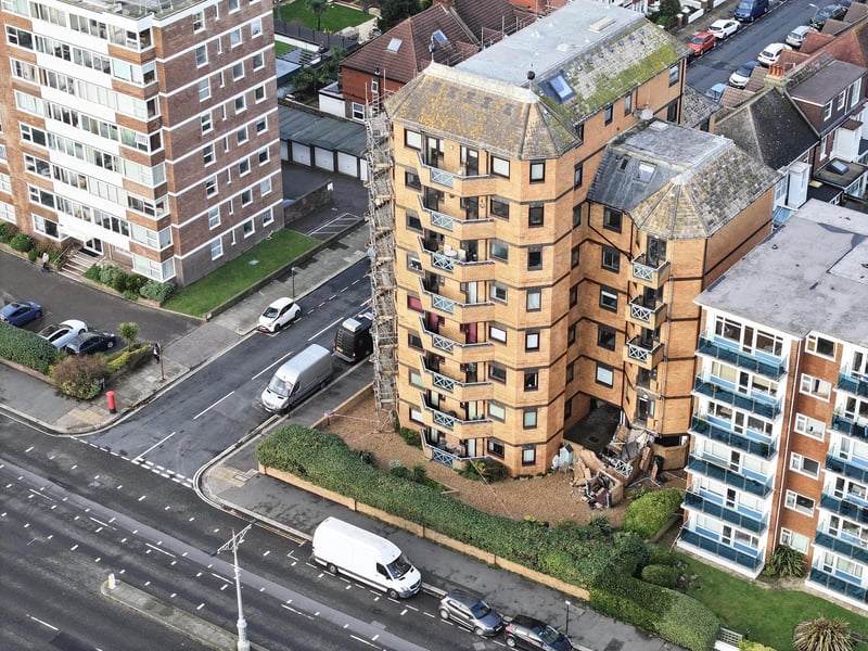 Residents in an East Sussex town have described their shock after two balconies collapsed at a residential block in the middle of Christmas celebrations.