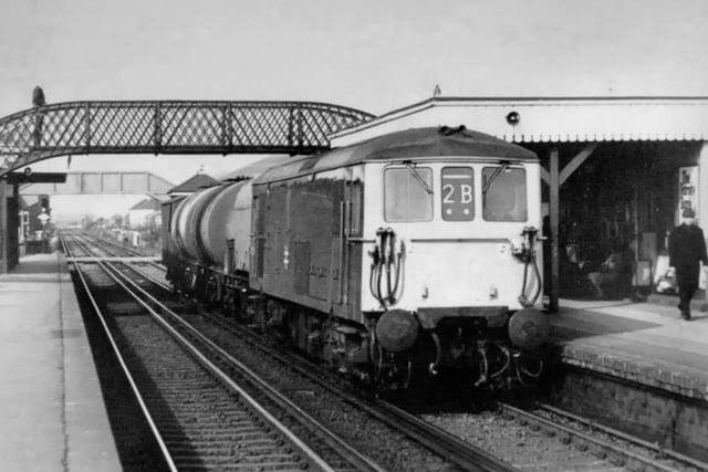 A diesel train at Hampden Park railway station