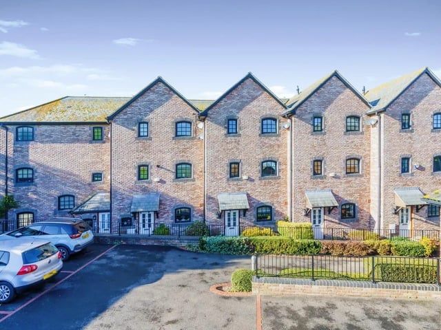 The property has access to a garage and parking space.