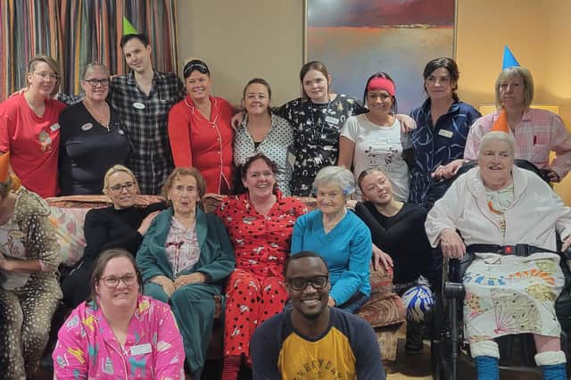 DRESSING DOWN. Team members and residents at Colten Care’s Wellington Grange care home in Chichester wear pyjamas in support of Children in Need. 
