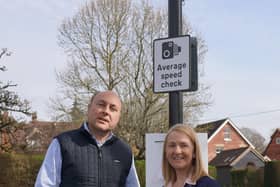 Andrew Griffith MP and Katy Bourne, Police and Crime Commissioner Sussex next to one of Chiddingfold's average speed cameras