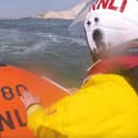 Newhaven RNLI said its volunteer lifeboat crew was alerted shortly after midday on Sunday (May 12) to two people cut off by the tide east of Seaford Beach. Photo: RNLI
