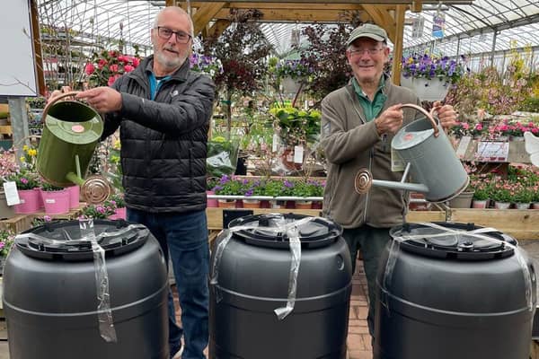 Budding Foundation founder, Clive Gravett, handing over water butts to Peter Burt from Hassocks Community Veg Patch 