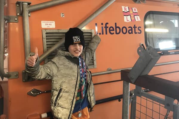 Nathan with the boats at the RNLI in Selsey.