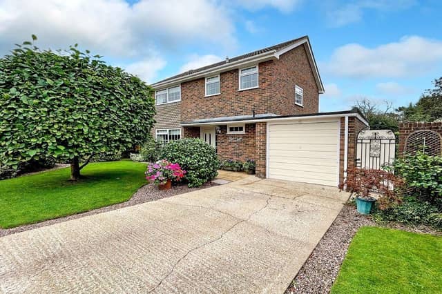 This three-bedroom, detached house with a stunning south-facing garden has come on the market with Graham Butt priced at £695,000