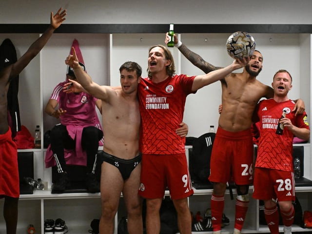The Crawley Town players celebrate victory during the EFL Sky Bet League 2 play-off second leg match between Milton Keynes Dons and Crawley Town at stadium:mk, Milton Keynes, England on 11 May 2024.:Crawley Town hammered MK Dons 5-1 - and 8-1 on aggregate - to reach the League Two play-off final Wembley. Photographer Dennis Goodwin/Pro Sport Images was there to catch the action, the crowd and the celebrations