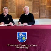 Mark Gerken and Peter James signing the new lease for Haywards Heath Golf Club