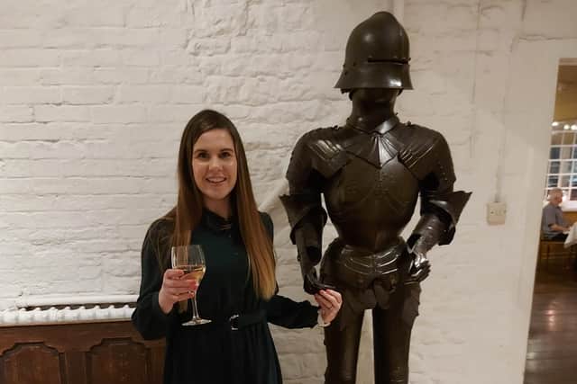 When you inexplicably get your husband to take a photo of you holding hands with a suit of armour while on your spa break