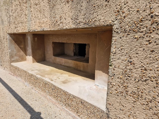 Pete Coe, one of the project leaders, and fellow former Royal Engineer Graham Cosham worked together to open the southern embrasure at the Ferring pillbox