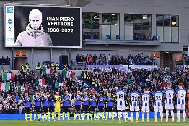 Players take part in a minutes applause in memory of former Tottenham Hotspur fitness coach Gian Piero Ventron ahead of the Premier League match against Brighton