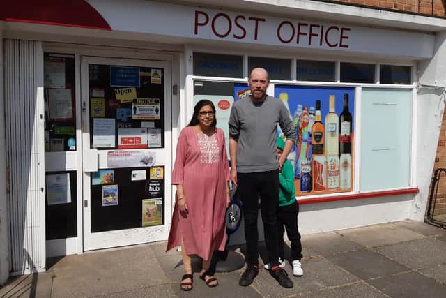 Alka Sthankiya with Chris Button, who will be taking over the post office on Friday