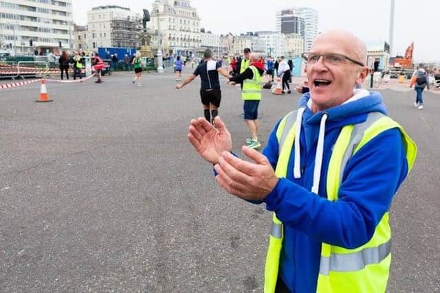 Volunteers enjoy the Brighton Half Marathon as much as the runners, it seems!