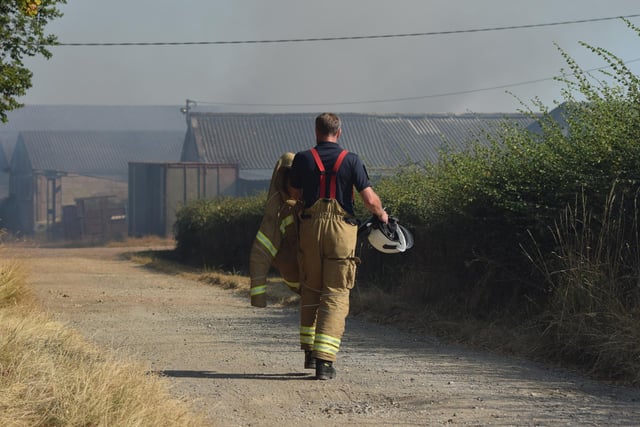 Dramatic pictures as firefighters tackle barn fire in Hailsham