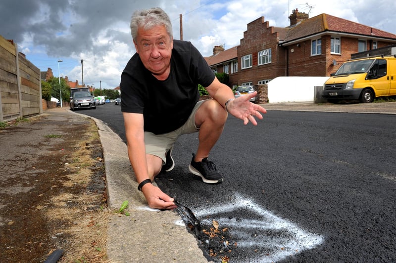 Hurst Avenue resident John Frew is frustrated with the recent resurfacing of the road outside his home