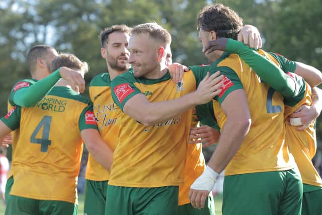 Horsham celebrate on their way to beating Dorking in the last round – setting up their first round spot. Picture by Natalie Mayhew/ButterflyFootball