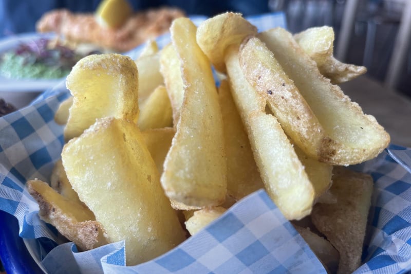 The chips, that accompany the burger.