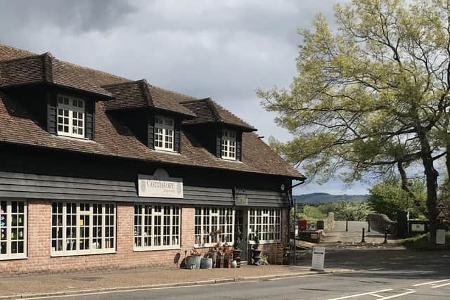 The Cornstore Emporium's car park adjoins the River Arun