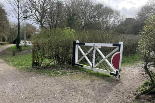 An old railway crossing gate and railway signal are on view at West Grinstead's former station