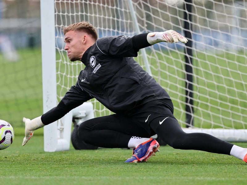 Brighton goalkeeper Bart Verbruggen gets down low