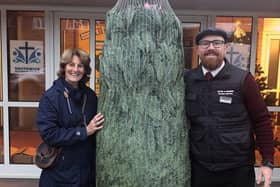 Michael Leach from Mayberry Garden Centre at Southwick Methodist Church where Julie Scarratt received the donated Christmas tree
