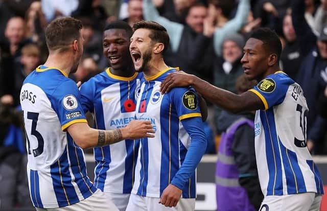Brighton midfielder Adam Lallana celebrates his goal in the Premier League win at Wolves