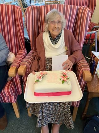 Betty Venner, at Heathfield, with her 100th Birthday Cake